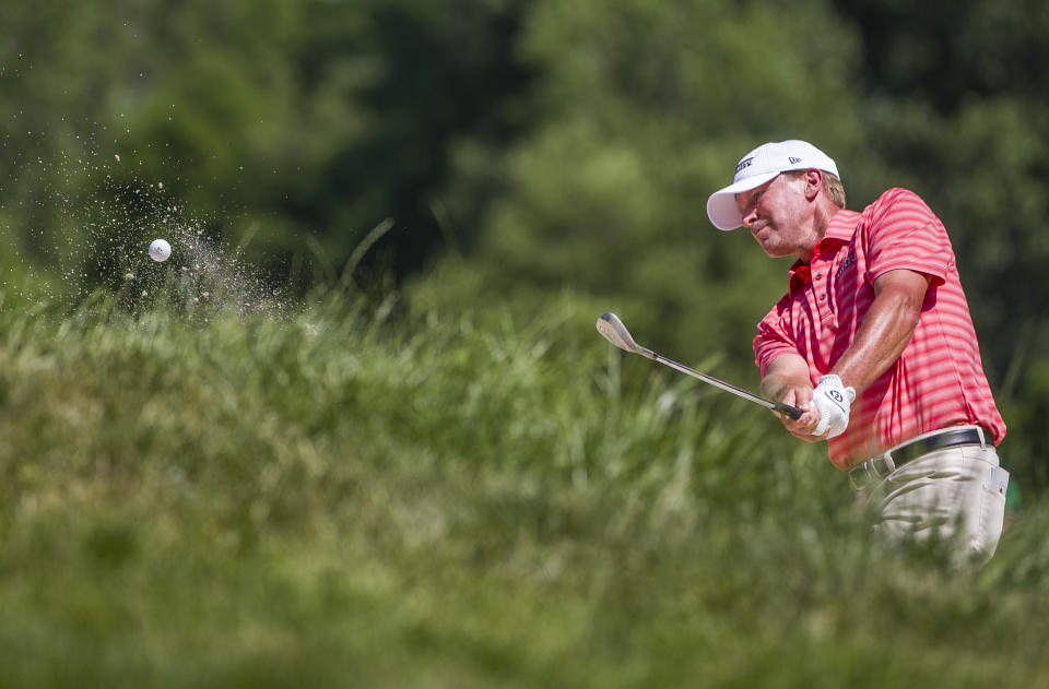 Steve Stricker hits out of a bunker on the second hole during the third round of the U.S. Senior Open golf tournament Saturday, June 29, 2019, at Warren Golf Course in South Bend, Ind. (Robert Franklin/South Bend Tribune via AP)