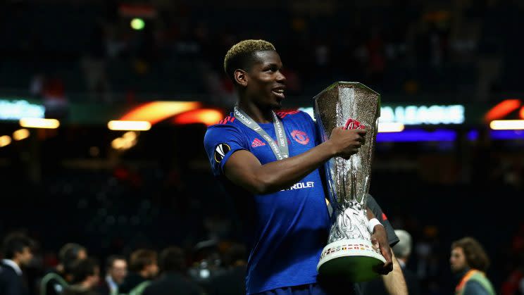 Paul Pogba with the Europa League trophy