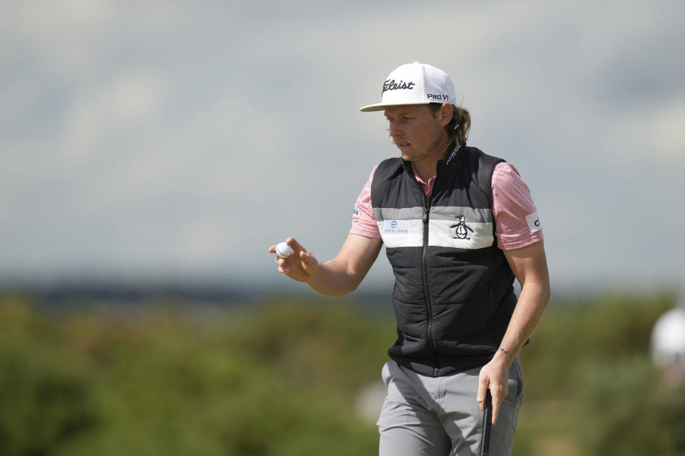 Cameron Smith, of Australia, after putting on the 9th green during the second round of the British Open golf championship on the Old Course at St. Andrews, Scotland, Friday July 15, 2022. The Open Championship returns to the home of golf on July 14-17, 2022, to celebrate the 150th edition of the sport's oldest championship, which dates to 1860 and was first played at St. Andrews in 1873. (AP Photo/Alastair Grant)