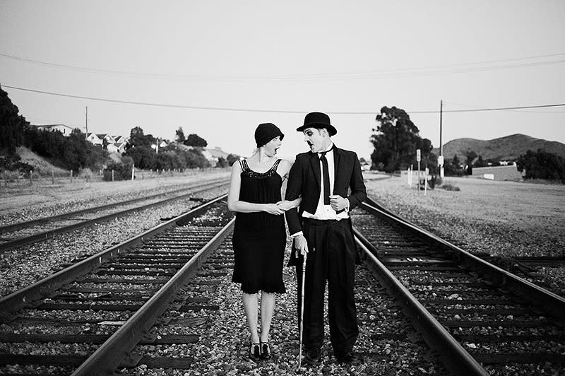 <div class="caption-credit"> Photo by: Ken Kienow Photography</div><div class="caption-title">Silent Film Engagement Photos</div>For part of their engagement photo shoot, Jess and Chad channeled the silent film era with Charlie Chaplin-inspired costumes, makeup, and props. <a rel="nofollow noopener" href="http://www.bridalguide.com/planning/engagement/charlie-chaplin-silent-film-inspired-engagement-photos" target="_blank" data-ylk="slk:See more from this shoot;elm:context_link;itc:0;sec:content-canvas" class="link "><b>See more from this shoot</b></a>!