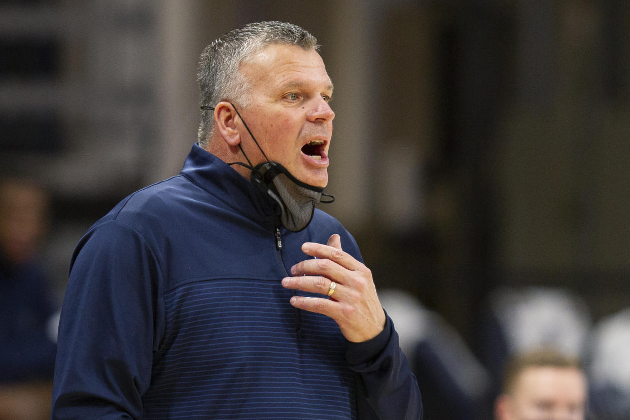 Creighton coach Greg McDermott shouts during the first half of the team's NCAA college basketball game against Villanova, Wednesday, March 3, 2021, in Villanova, Pa. (AP Photo/Laurence Kesterson)