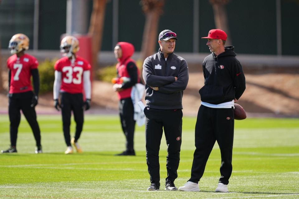 General manager John Lynch and head coach Kyle Shanahan speak during San Francisco 49ers practice (Getty Images)