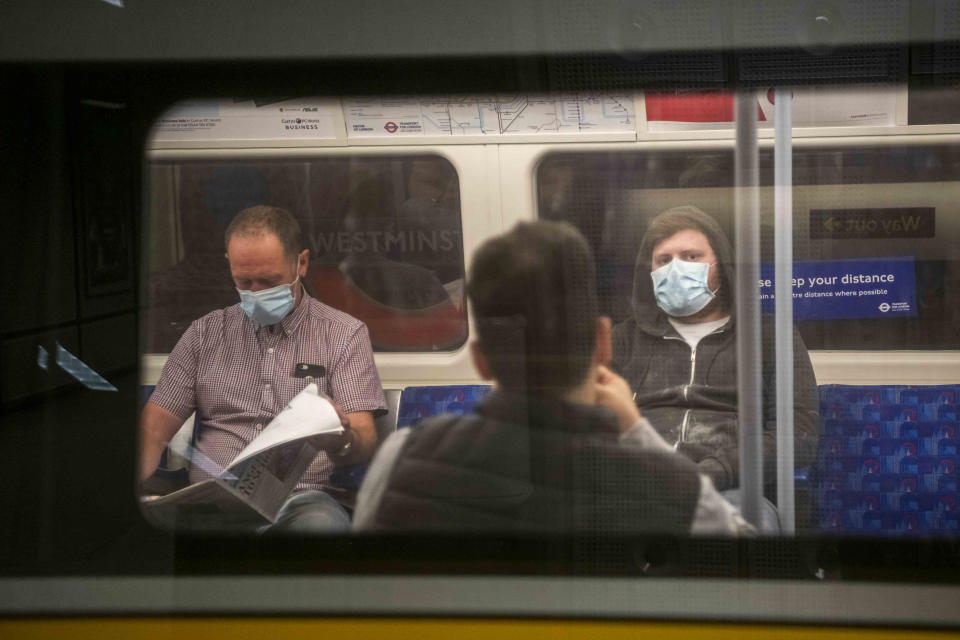 From Monday 15th of July wearing face coverings will be compulsory on public transport in England. Images from tube stations and lines showing members of the public with and without the masks.