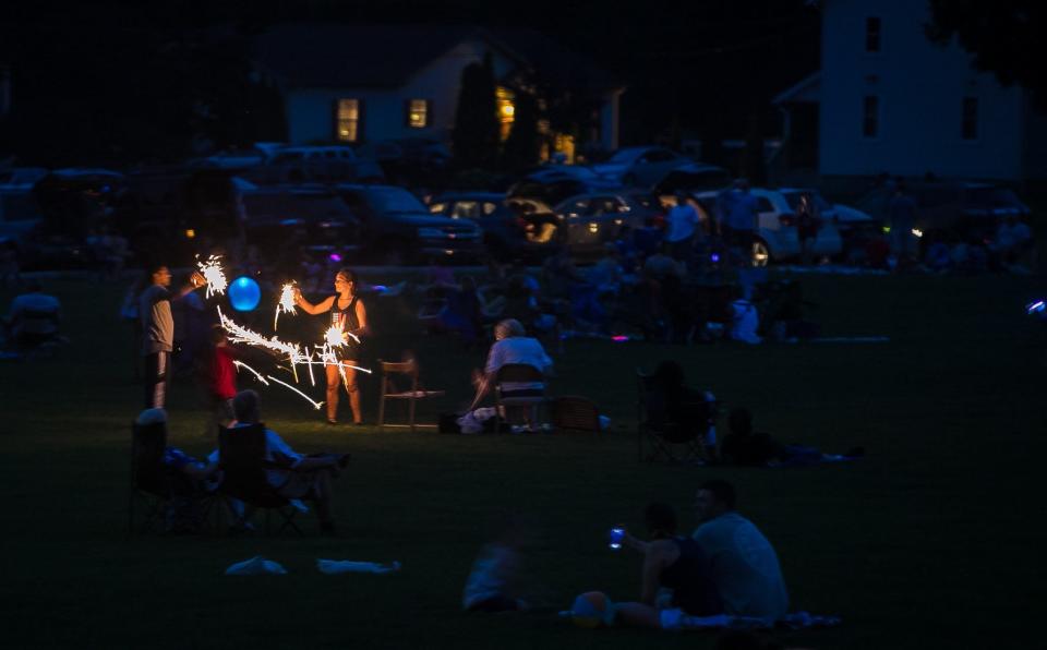 People gather at Swift Bicentennial Park and the surrounding sports fields for the Hockessin Fourth of July fireworks in 2018.