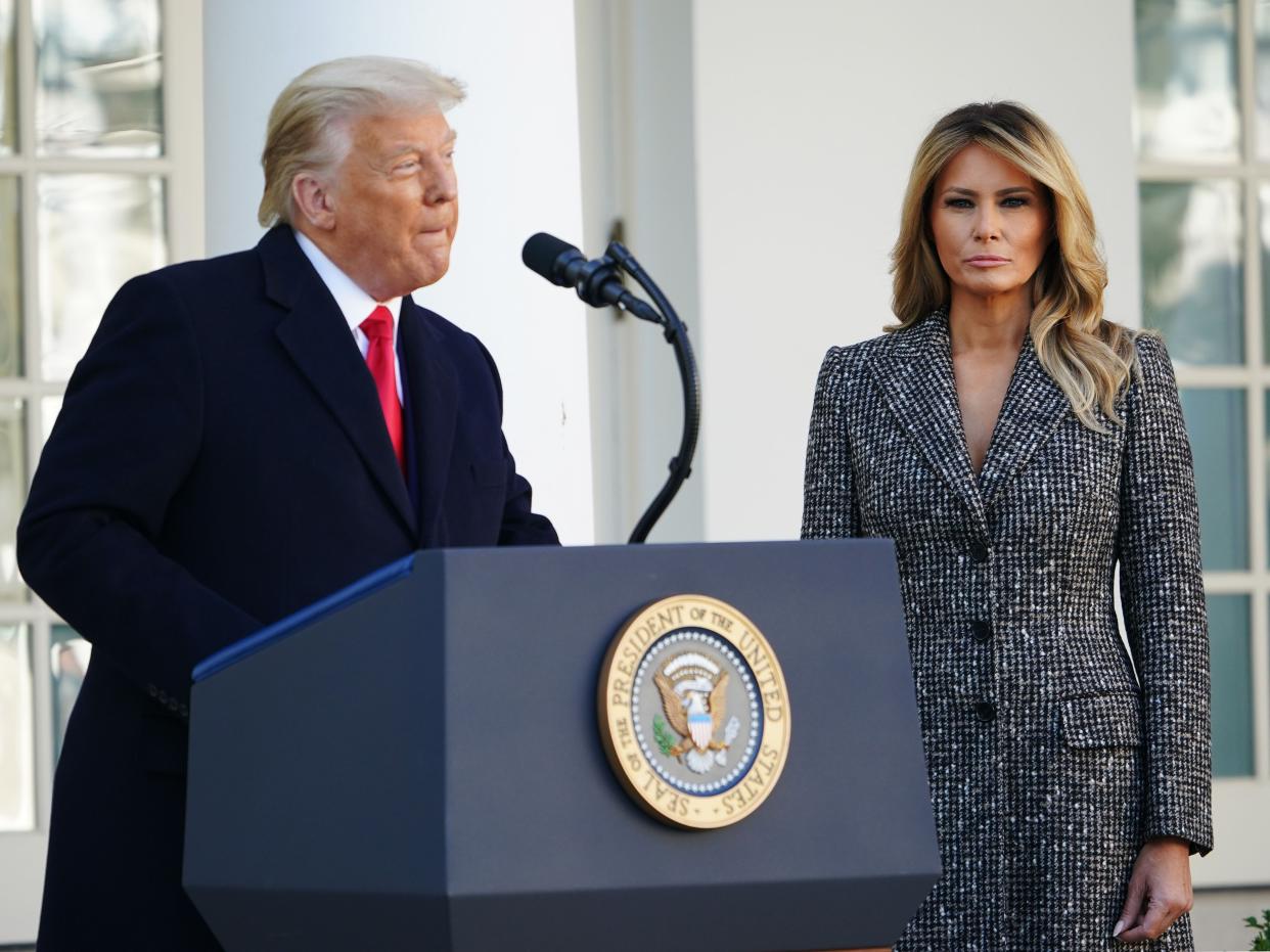 First Lady Melania Trump watches as US President Donald Trump speaks during the annual Thanksgiving turkey pardon in the Rose Garden of the White House in Washington, DC on November 24, 2020 (AFP via Getty Images)