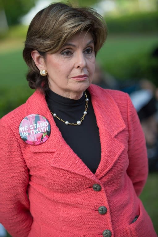 Gloria Allred gathers with protestors outside of Bill Cosby's "Far from Finished" Tour on May 2, 2015 in Atlanta, Georgia