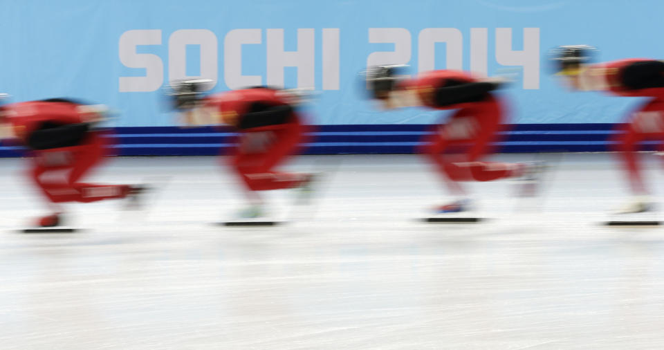 Chinese skaters train during a short track speedskating practice session at the Iceberg Skating Palace ahead of the 2014 Winter Olympics, Thursday, Feb. 6, 2014, in Sochi, Russia. (AP Photo/Darron Cummings)