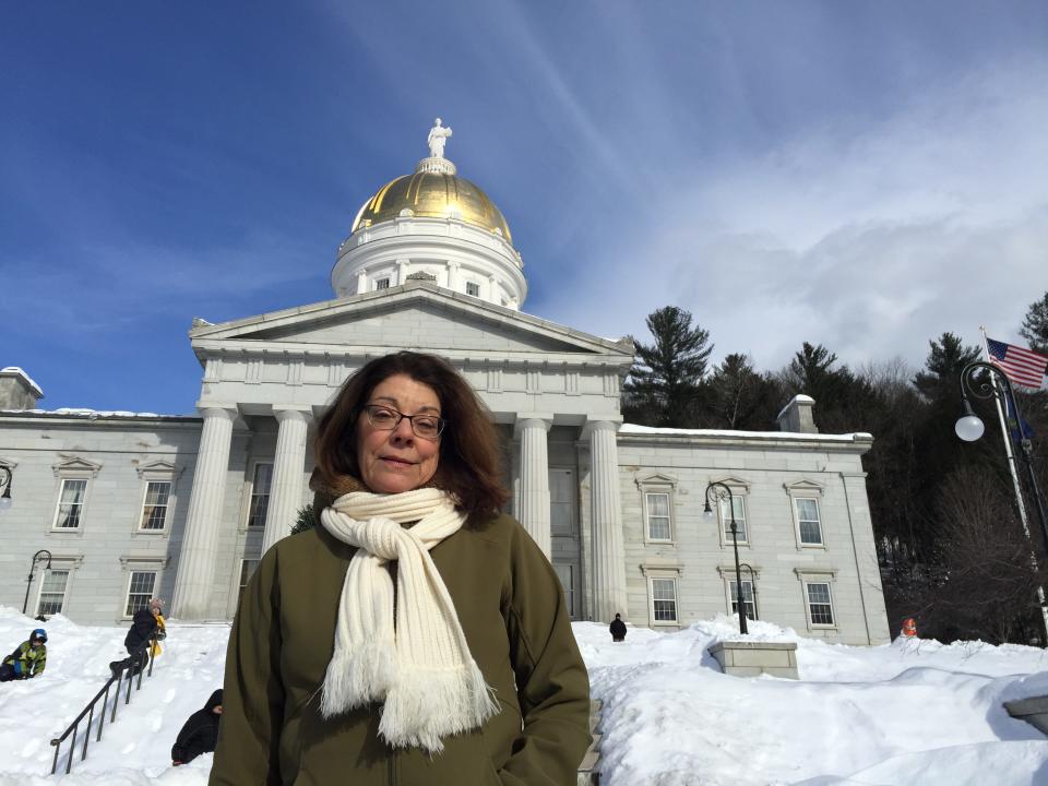 Mary Beerworth, executive director of Vermont Right to Life, takes a moment on the steps of the Vermont State House, before joining anti-abortion marchers inside on Jan. 26, 2019.