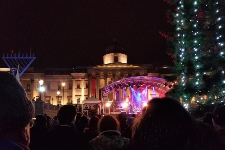 The menorah was placed next to the traditional Trafalgar Square Christmas tree (Sadiq Khan / Twitter)