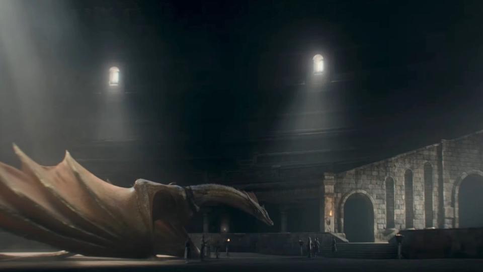 A large golden dagon named Sunfyre inside the Dragonpit on HBO