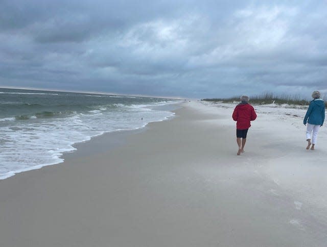 Walking on the beach in Mexico Beach, Florida, 2023.