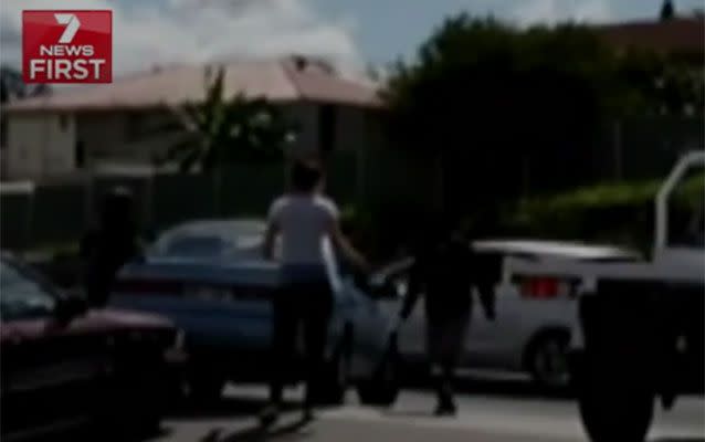 The man can be seen angrily approaching the young mother. Photo: 7 News