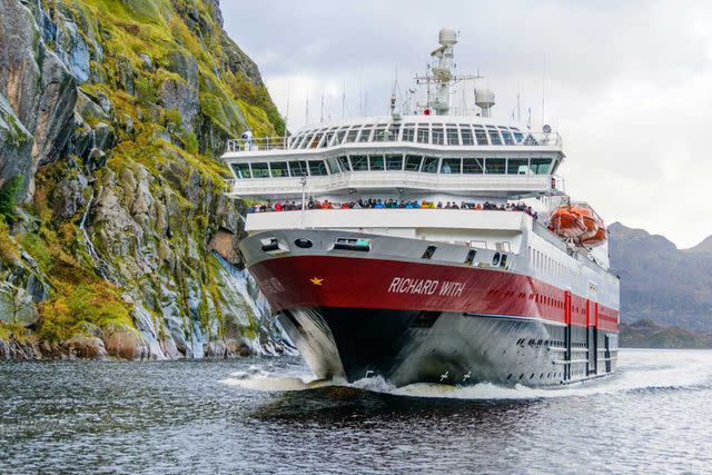 <p>Robert Cranna/Courtesy of Hurtigruten</p> Hurtigruten’s Richard With sails the fjords in Norway.