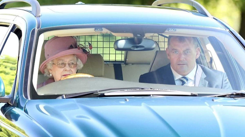 Queen Elizabeth behind the wheel of her 2009 Jaguar X-Type Estate