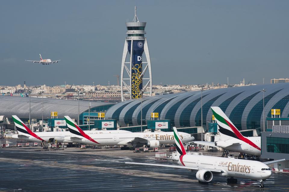 FILE - An Emirates jetliner comes in for landing at the Dubai International Airport in Dubai, United Arab Emirates, Dec. 11, 2019. Dubai International Airport will see its passenger numbers this year eclipse its pre-pandemic passenger figures in 2019, showing the strong rebound in travel after coronavirus outbreak and the global lockdowns that grounded aircraft worldwide, a top official said Wednesday, Nov. 15, 2023. (AP Photo/Jon Gambrell, File)