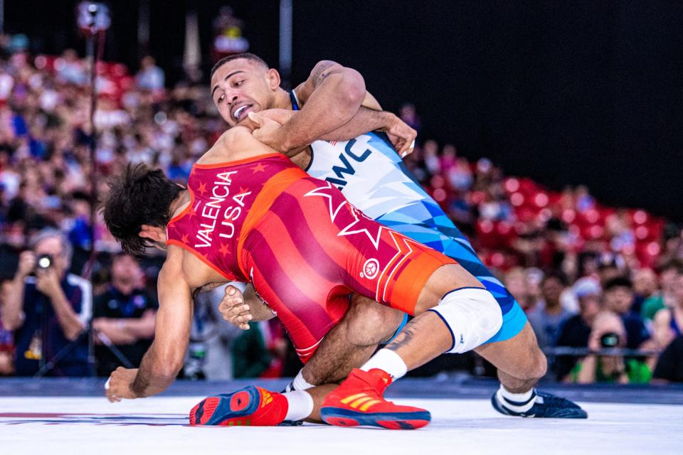 Aaron Brooks, top, rallies to beat Zahid Valencia 10-6 in the U.S. Open finals in Las Vegas on Friday night.