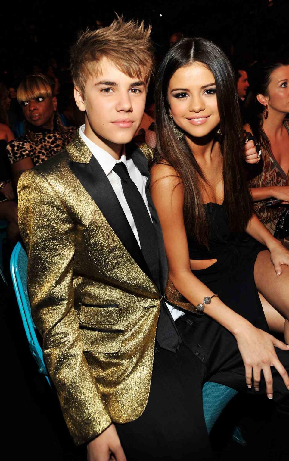 Justin Bieber (L) and Selena Gomez pose during the 2011 Billboard Music Awards at the MGM Grand Garden Arena May 22, 2011 in Las Vegas, Nevada