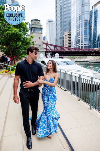 <p>Neringa Plank NeriPhoto</p> Jake Chelios and Madelyn Iacurci outside of Chicago Cut Steakhouse at their wedding welcome party on July 7, 2023