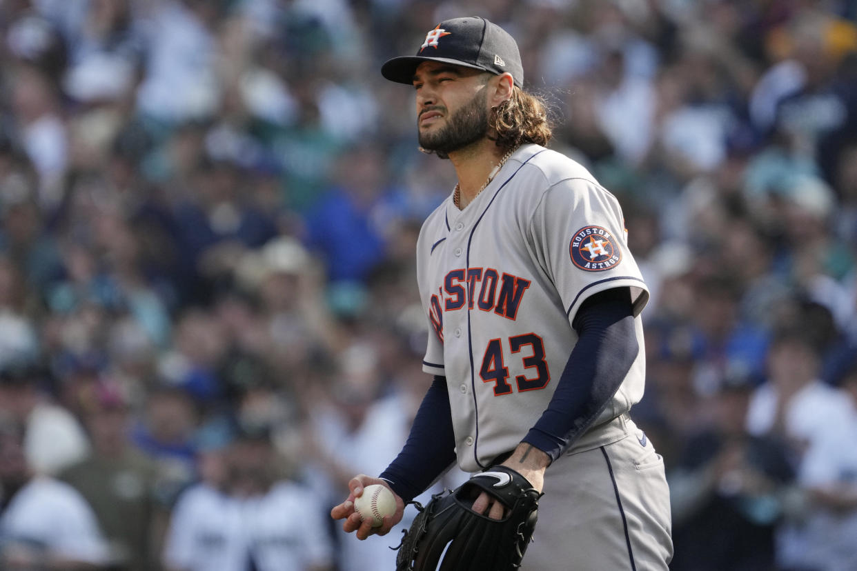 Houston Astros starting pitcher Lance McCullers Jr. (43) reacts after walking Seattle Mariners right fielder Mitch Haniger during the second inning in Game 3 of an American League Division Series baseball game Saturday, Oct. 15, 2022, in Seattle. (AP Photo/Ted S. Warren)
