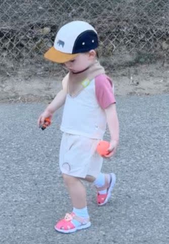 <p>Olivia Munn/Instagram</p> Olivia Munn's son Malcolm takes a walk.