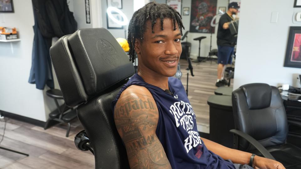 Sean Moore has a distinct set of Columbus icons on his right arm: the Columbus Dispatch nameplate; an I-270 highway sign, and three jerseys including one representing Reynoldsburg High School. His tattoos were applied by T King of Tattoo Kings, 1450 Morse Rd.