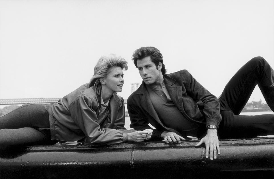 John Travolta and Olivia Newton-John star in the film ‘Two of a Kind’ in New York, 1983. - Credit: Juergen Vollmer/Popperfoto/Getty Images