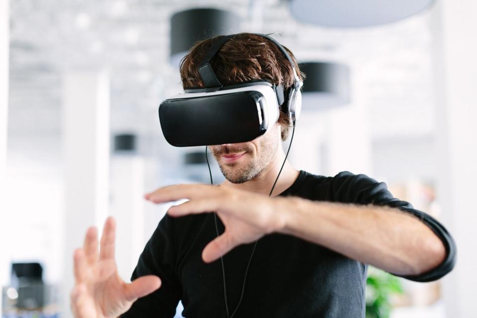 Man using VR headsets.