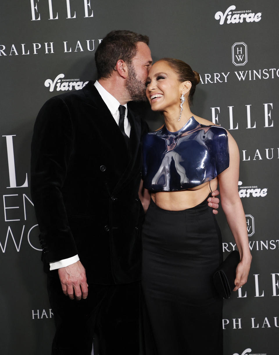 US singer and actress Jennifer Lopez and husband US actor Ben Affleck arrive for Elle's 2023 Women in Hollywood celebration, at Nya Studios in Los Angeles, California, on December 5, 2023. (Photo by Michael Tran / AFP) (Photo by MICHAEL TRAN/AFP via Getty Images)