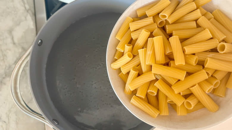 Adding pasta to pot