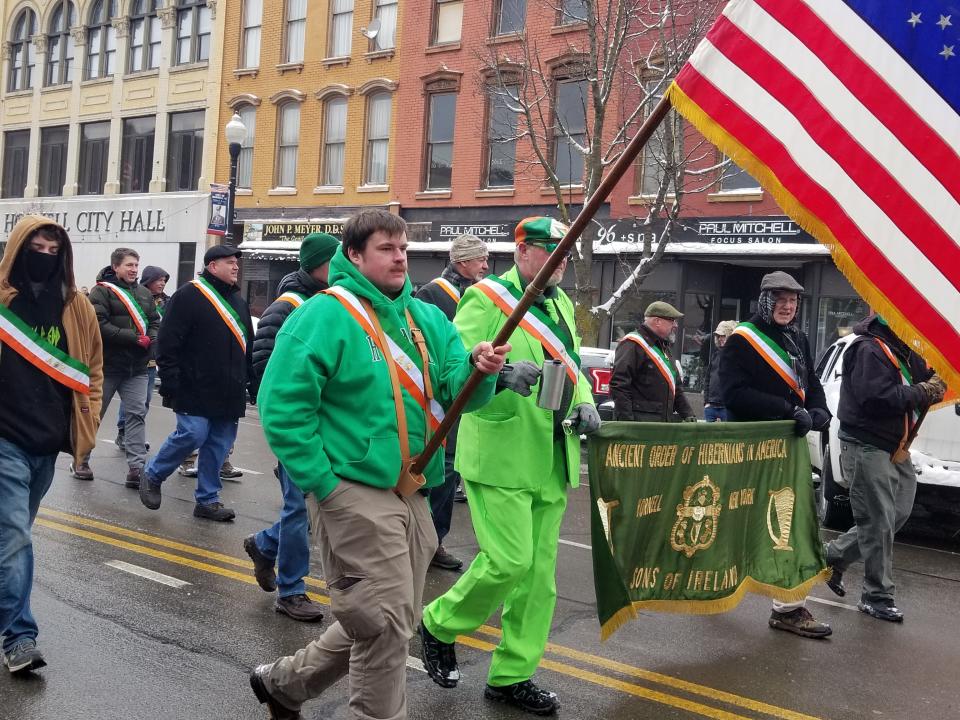 The Ancient Order of Hibernians march down Main Street during the 2022 St. Patrick's Day parade in the City of Hornell.