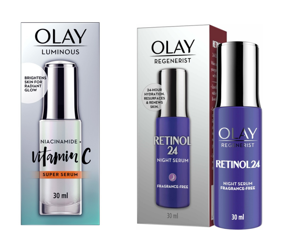 Olay's Vitaminc C Super Serum in a silver and blue-hued box on the left while the purple bottle of the Olay Retinol 24 Serum stands next to its box on a white background.