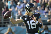 Jacksonville Jaguars quarterback Trevor Lawrence (16) sets back to pass during the first half of an NFL football game against the Baltimore Ravens, Sunday, Nov. 27, 2022, in Jacksonville, Fla. (AP Photo/Phelan M. Ebenhack)