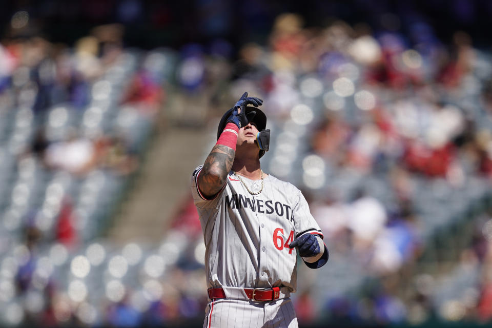 Minnesota Twins' Jose Miranda celebrates hitting a double during the fifth inning of a baseball game against the Los Angeles Angels, Sunday, April 28, 2024, in Anaheim, Calif. (AP Photo/Ryan Sun)