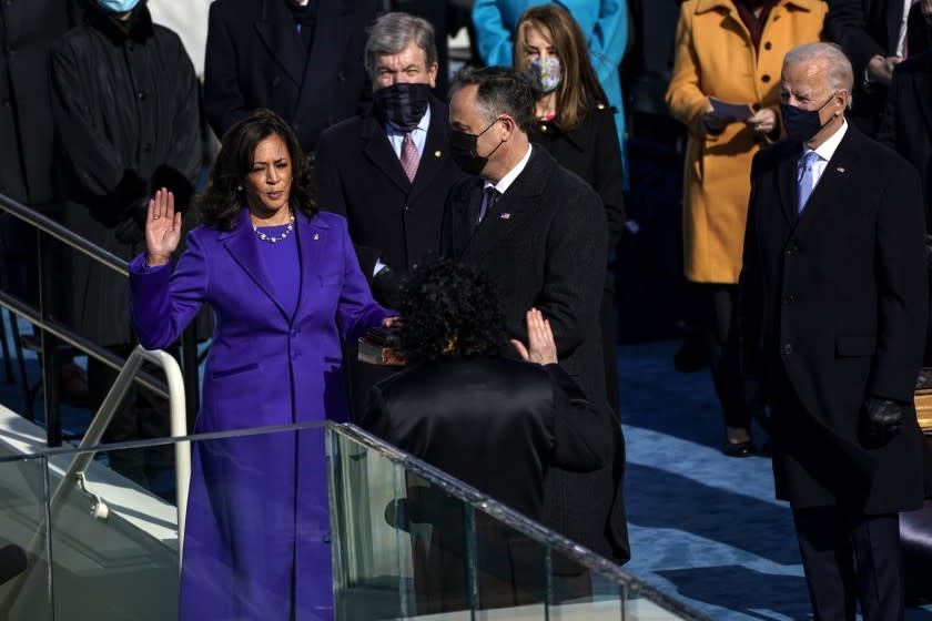 Washington , DC - January 20: U.S. Vice President-elect Kamala Harris takes the oath of office from Supreme Court Justice Sonia Sotomayor during the 59th presidential inauguration in Washington, D.C. on Wednesday, Jan. 20, 2021. (Kent Nishimura / Los Angeles Times)