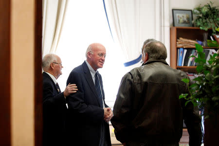 New Hampshire's Bill Gardner, the longest-serving secretary of state in the U.S., meets with people outside his office the morning before the state legislature meets to vote for secretary of state in Concord, New Hampshire, U.S., December 5, 2018. REUTERS/Elizabeth Frantz