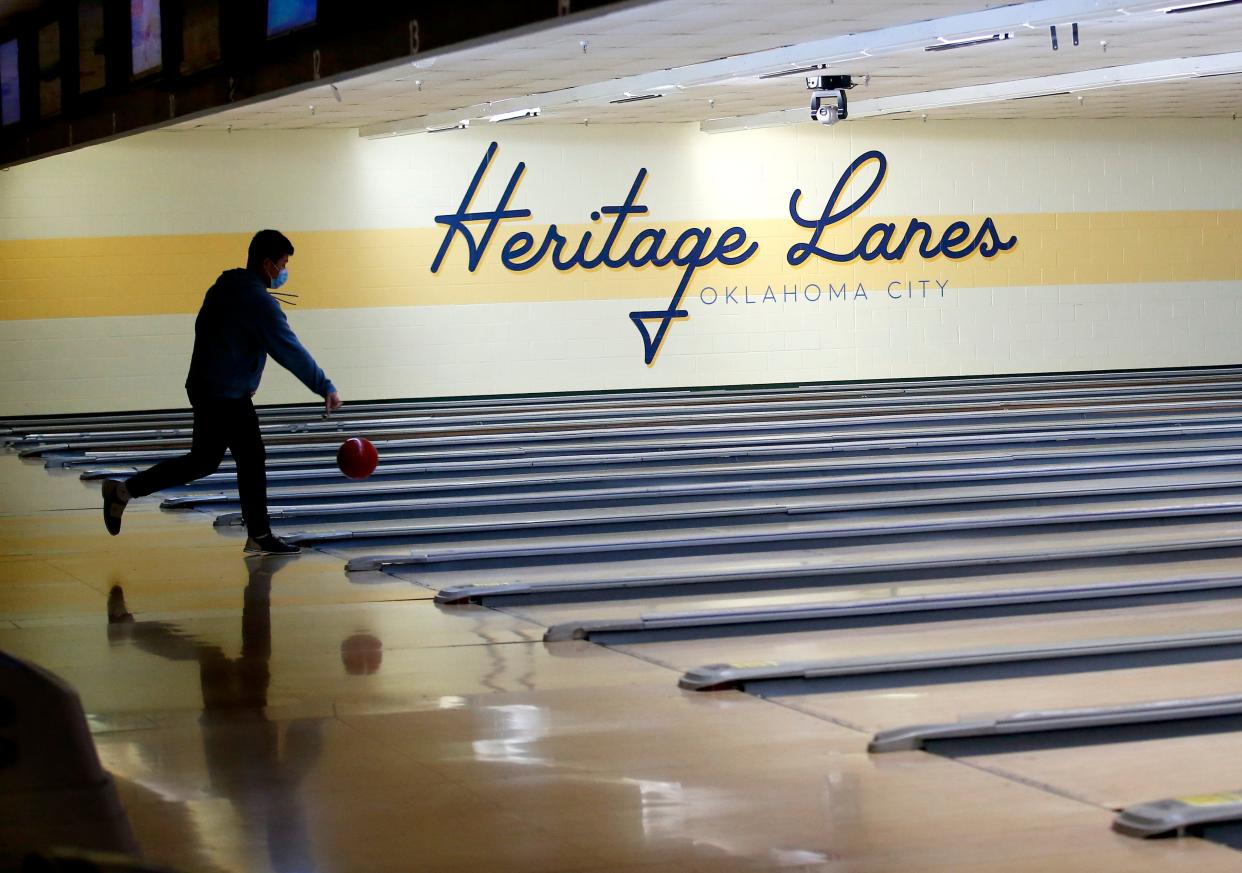 A person bowls Jan. 12 at Heritage Lanes in Oklahoma City.