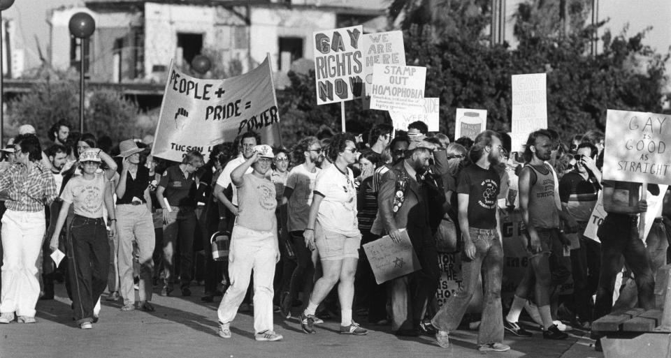 June 1981: About 650 demonstrators left Patriots Square for the state Capitol in a lesbian- and gay-rights march in the sweltering 107-degree heat.
The “We Are Here” march, which stretched 1.5 blocks, ended on the east lawn of the Capitol, where marchers heard speakers Leonard Matlovich and feminist Arlie Scott of the National Organization for Women.