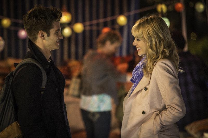 This image released by Sony Pictures shows Andrew Garfield and Emma Stone in "The Amazing Spider-Man 2." (AP Photo/Columbia Pictures - Sony Pictures, Niko Tavernise)