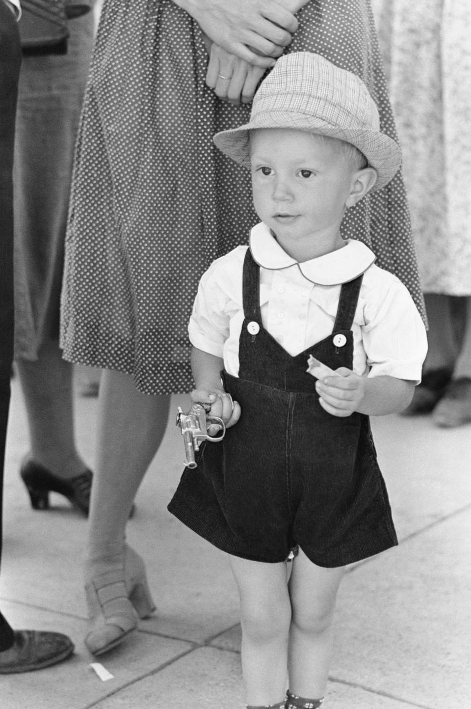 <p>A child attends an Independence Day celebration in Vale, Ore., 1941. (Photo; Corbis via Getty Images) </p>