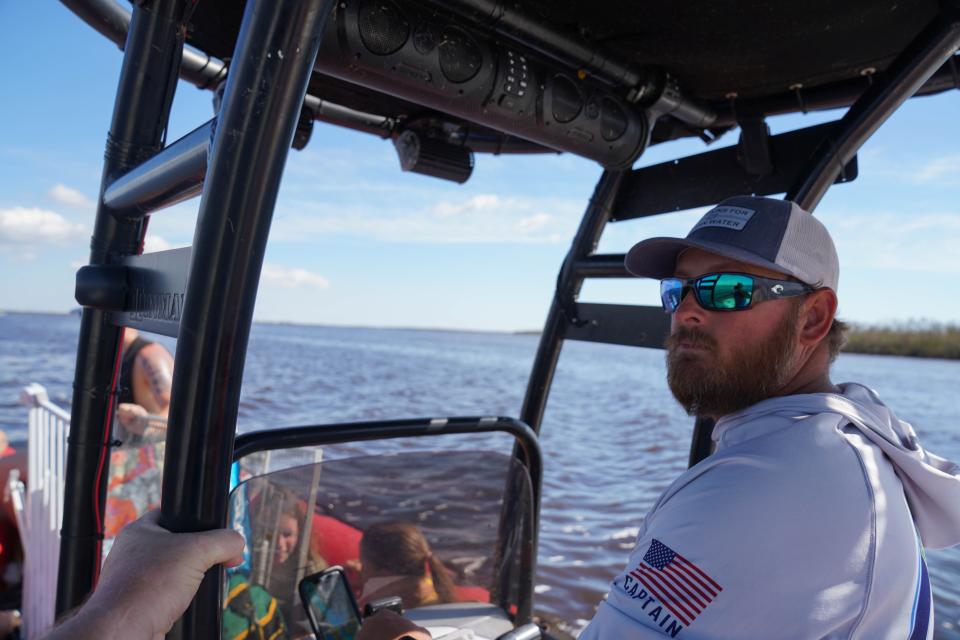 Chase Hussey, 36, said he couldn't sit still after he watched his home float away, so he started volunteering to shuttle people and supplies to Pine Island, Fla., on Monday.