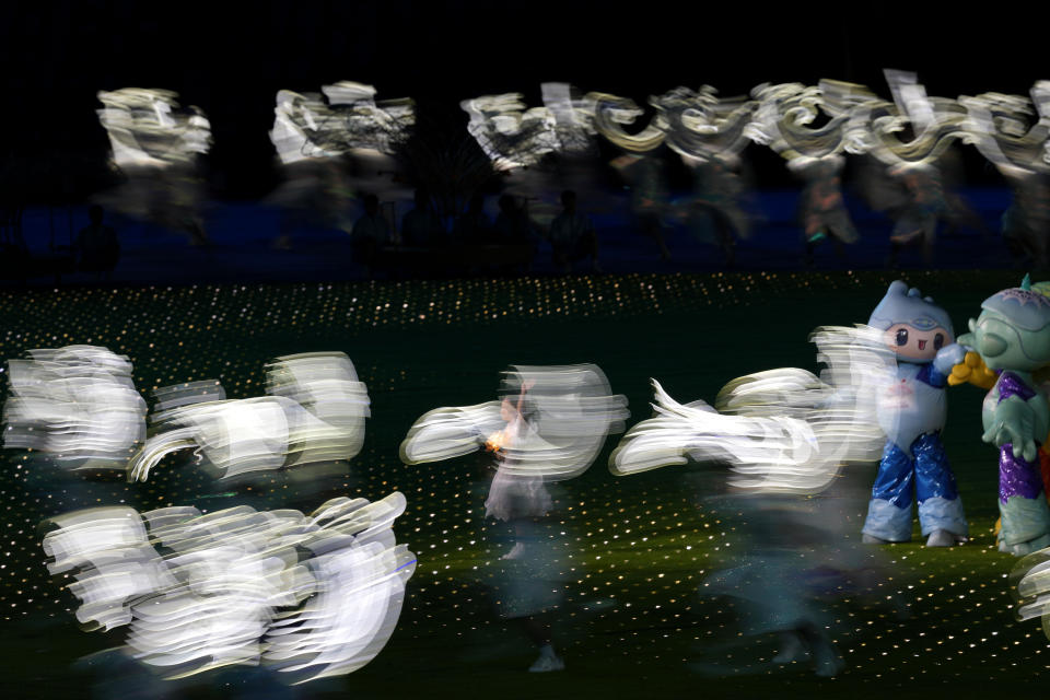 Dancers perform during the closing ceremony of the 19th Asian Games in Hangzhou, China, Sunday, Oct. 8, 2023. (AP Photo/Aaron Favila)