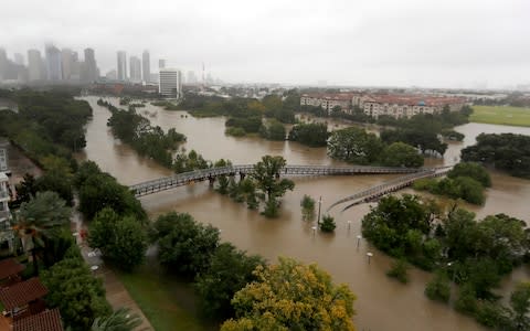 Rain continues to fall on Monday  - Credit: Houston Chronicle via AP