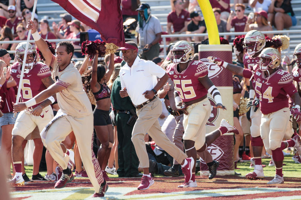 TALLAHASSEE, FL - SEPTEMBER 07: Florida State Seminoles head coach Willie Taggart runs onto the field with his team before the game between Florida State Seminoles and the Louisiana-Monroe Warhawks on September 7, 2019, at Doak Campbell Stadium in Tallahassee, Florida. (Photo by Logan Stanford/Icon Sportswire via Getty Images)