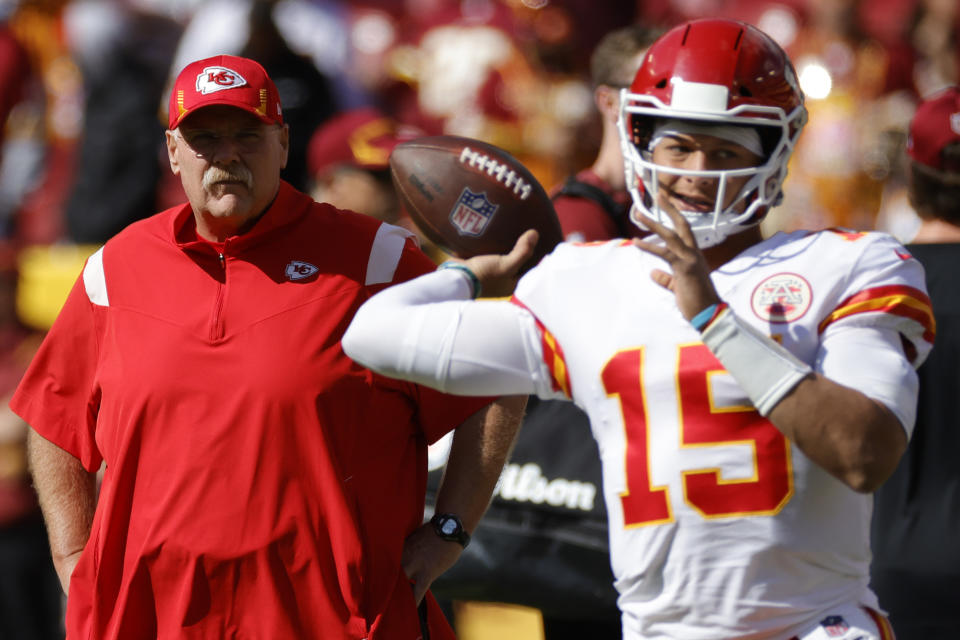 Kansas City Chiefs head coach Andy Reid (L) watches as Chiefs quarterback Patrick Mahomes (15). Mandatory Credit: Geoff Burke-USA TODAY Sports