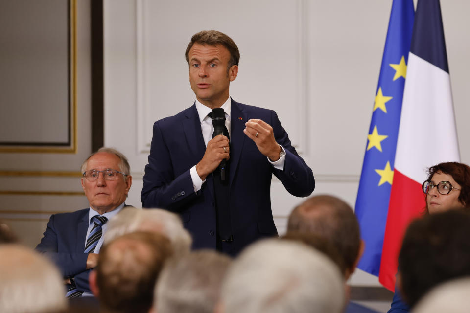 French President Emmanuel Macron addresses mayors of cities affected by the violent clashes that erupted after a teen was shot dead by police last week during a meeting at the presidential Elysee Palace in Paris Tuesday, July 4, 2023. After the death of a 17-year-old shot by police in a Paris suburb, French President Emmanuel Macron was meeting with mayors of 220 towns from across the country which were hit by violence. Across France, 34 buildings — many of them linked to the government — were attacked from Sunday into Monday, along with 297 vehicles. (Ludovic Marin, Pool via AP)