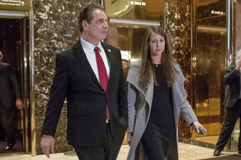 FILE — In this Jan. 18, 2017 file photo, New York Gov. Andrew Cuomo, accompanied by his chief of staff Melissa DeRosa, walks to talk with members of the media after meeting with President-elect Donald Trump at Trump Tower in New York. De Rosa, Cuomo's top aide, told top Democrats frustrated with the administration's long-delayed release of data about nursing home deaths that the administration "froze" over worries about what information was "going to be used against us," according to a Democratic lawmaker who attended the Wednesday, Feb. 10, 2021 meeting and a partial transcript provided by the governor's office. (AP Photo/Andrew Harnik, File)