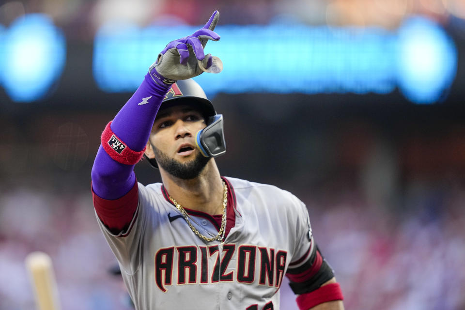 Arizona Diamondbacks' Lourdes Gurriel Jr. celebrates after a home run off Philadelphia Phillies starting pitcher Aaron Nola during the second inning in Game 6 of the baseball NL Championship Series in Philadelphia Monday, Oct. 23, 2023. (AP Photo/Brynn Anderson)