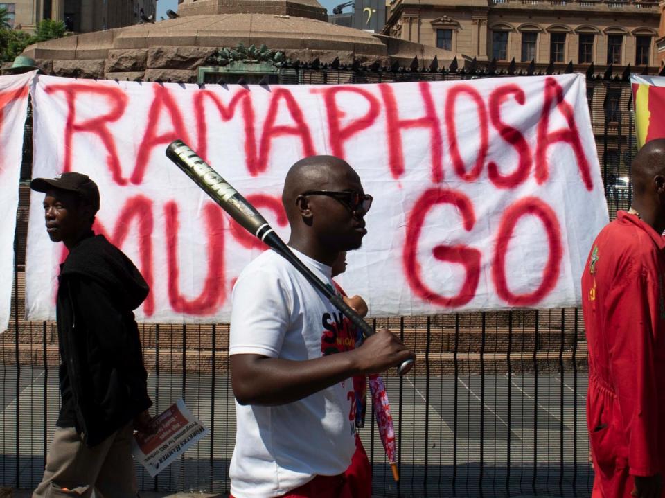 EFF supporters march against Cyril Ramaphosa in Pretoria (Kim Ludbrook/EPA)