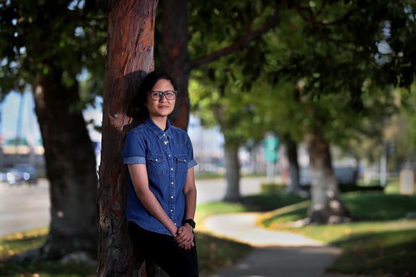 Irvine, CA - July 11: Kim Nguyen, who is recovering from an eating disorder, is photographed outside the Center for Discovery in Irvine Tuesday, July 11, 2023. Kim Nguyen weighed just 80 pounds when she and her psychiatrist decided she needed to be admitted to a partial hospitalization program. But because Kim has MediCal, it took close to a year working with half a dozen bureaucracies to actually get it. The recent spike in eating disorders among MediCal patients has pushed California to reform its Byzantine system for accessing care. But those reforms have stalled, leaving thousands of severely ill patients with no clear path to help.(Allen J. Schaben / Los Angeles Times)