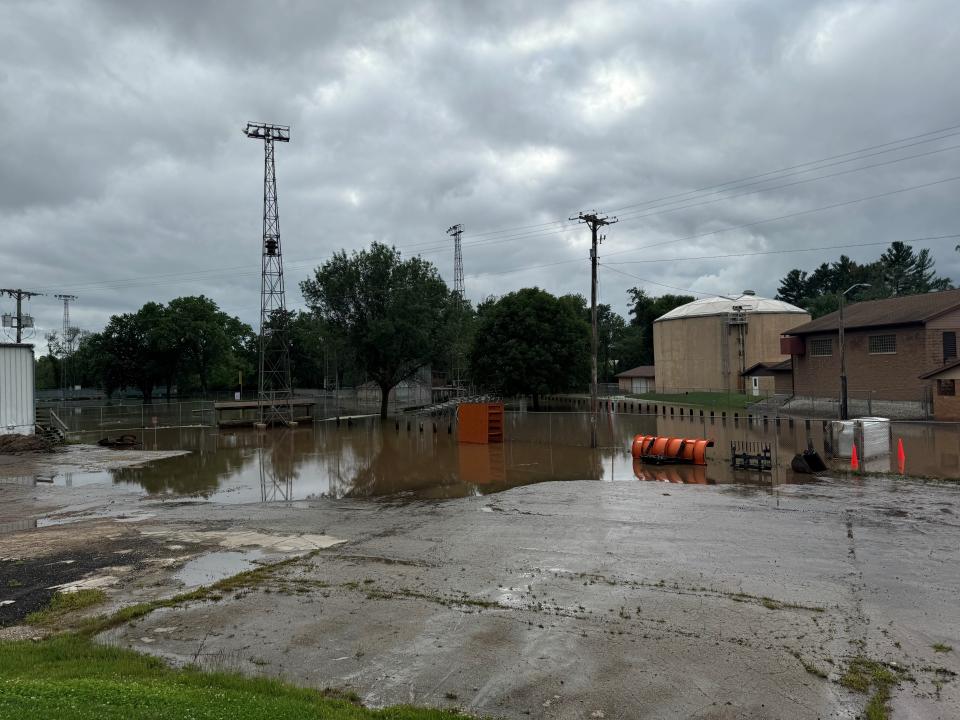 Some floodwaters remained Friday afternoon, July 5, 2024, outside the wastewater treatment plant in Manawa, Wis. Earlier in the day, flooding at the plan led the city to issue a boil water advisory and encourage citizens to avoid walking in flood waters due to the possiblity of unknown contaminants.